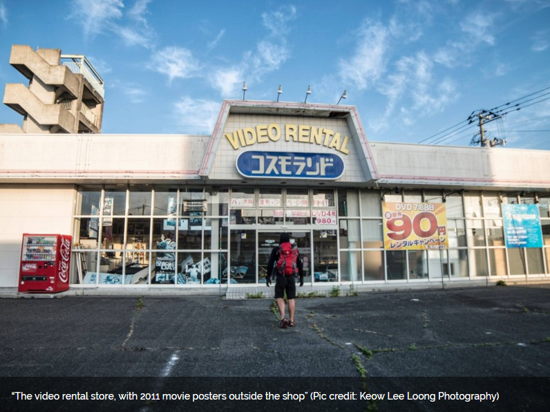 fukushima video rental store with 2011 movie signs